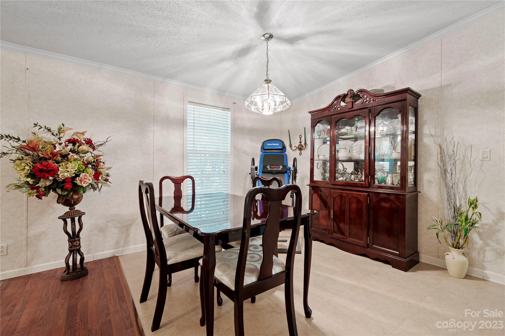 442 Tirzah Church Road Lancaster, SC 29720 - Photo 7 of 29 a view of a dining room with furniture and a chandelier