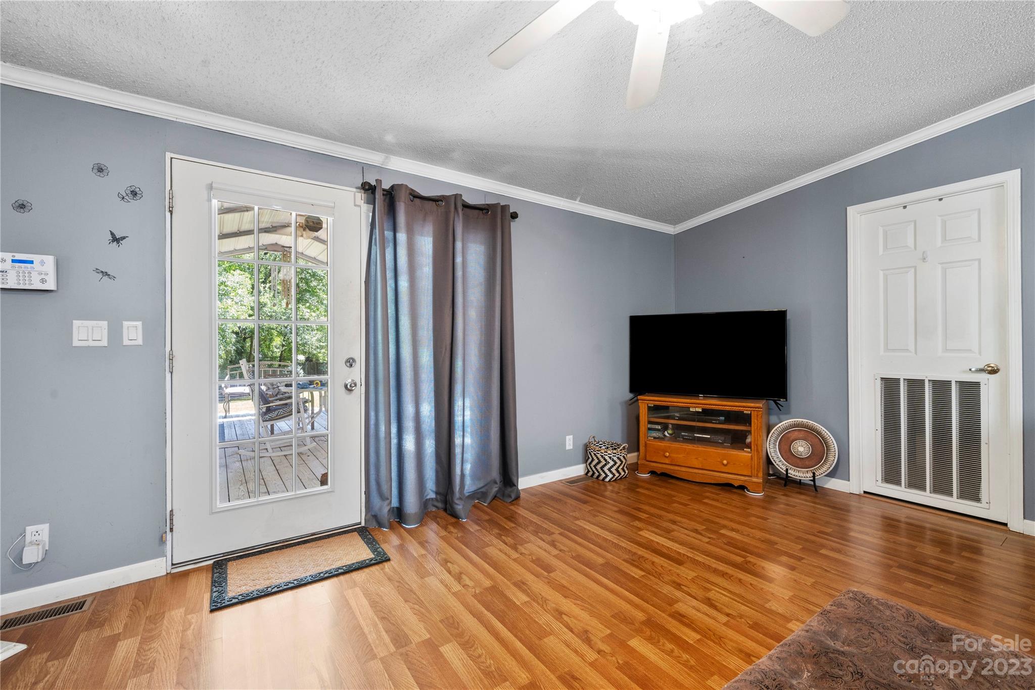 442 Tirzah Church Road Lancaster, SC 29720 - Photo 10 of 29 a room with a flat screen tv and a window