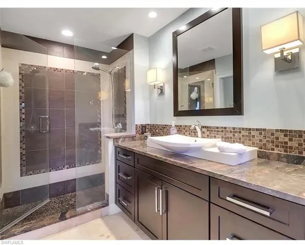 a bedroom with a bed and a closet