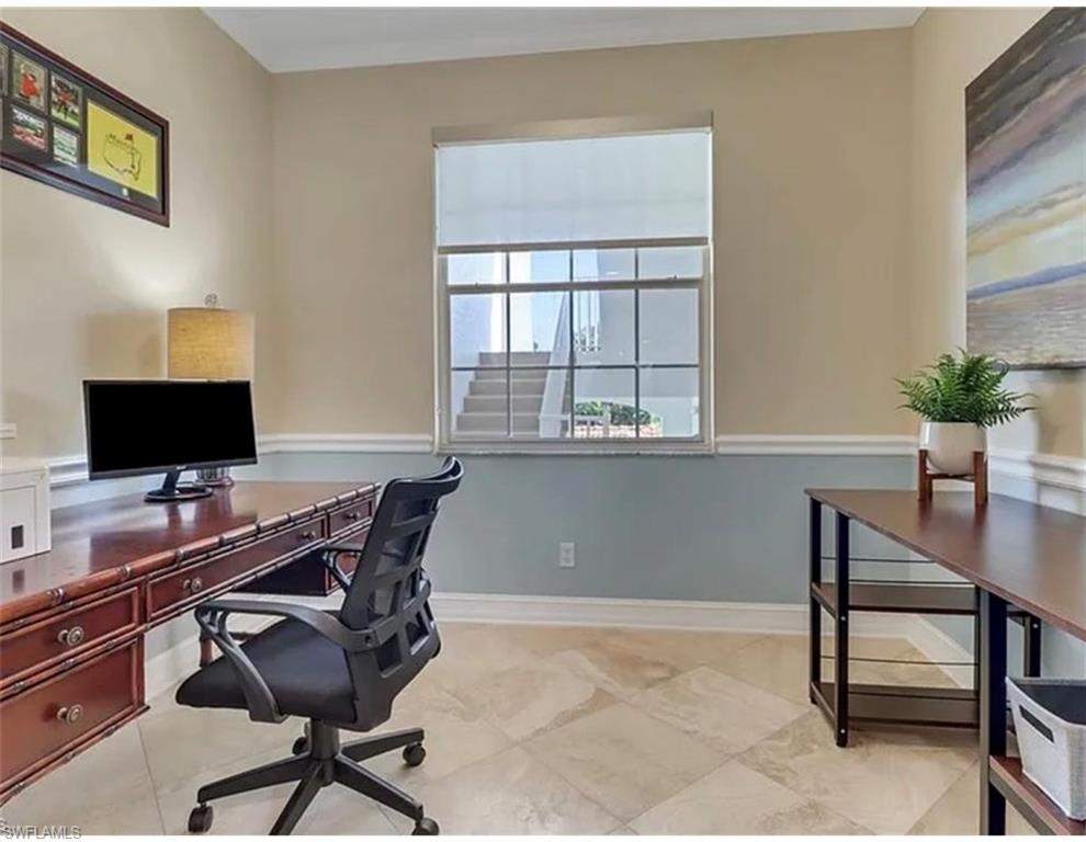 4650 Yacht Harbor Drive, Unit 125 Naples, FL 34112 - Photo 18 of 20 a view of a workspace with furniture and a window
