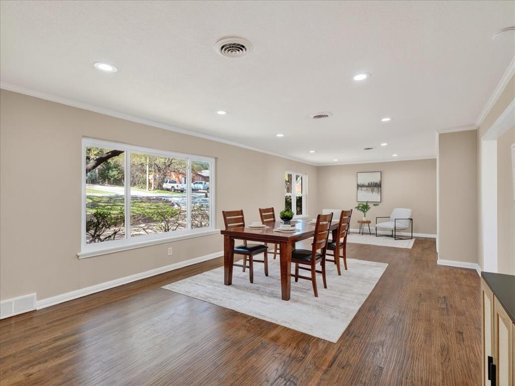 3863 Clayton Road East Fort Worth, TX 76116 - Photo 6 of 39 a view of a dining room with furniture and wooden floor