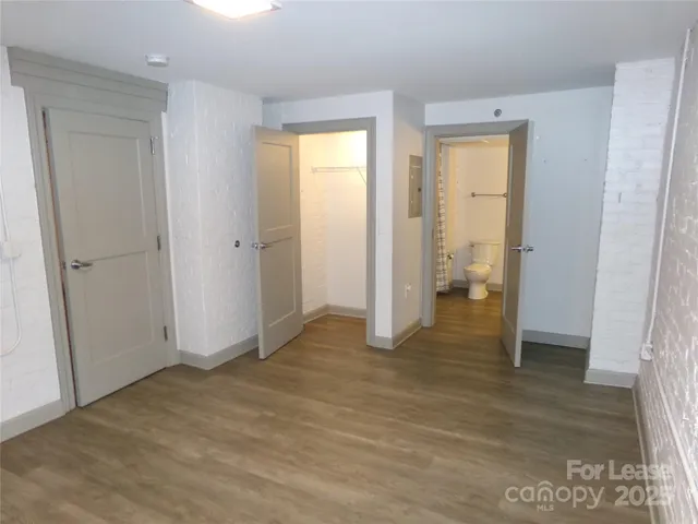 wooden floor and closet in a room