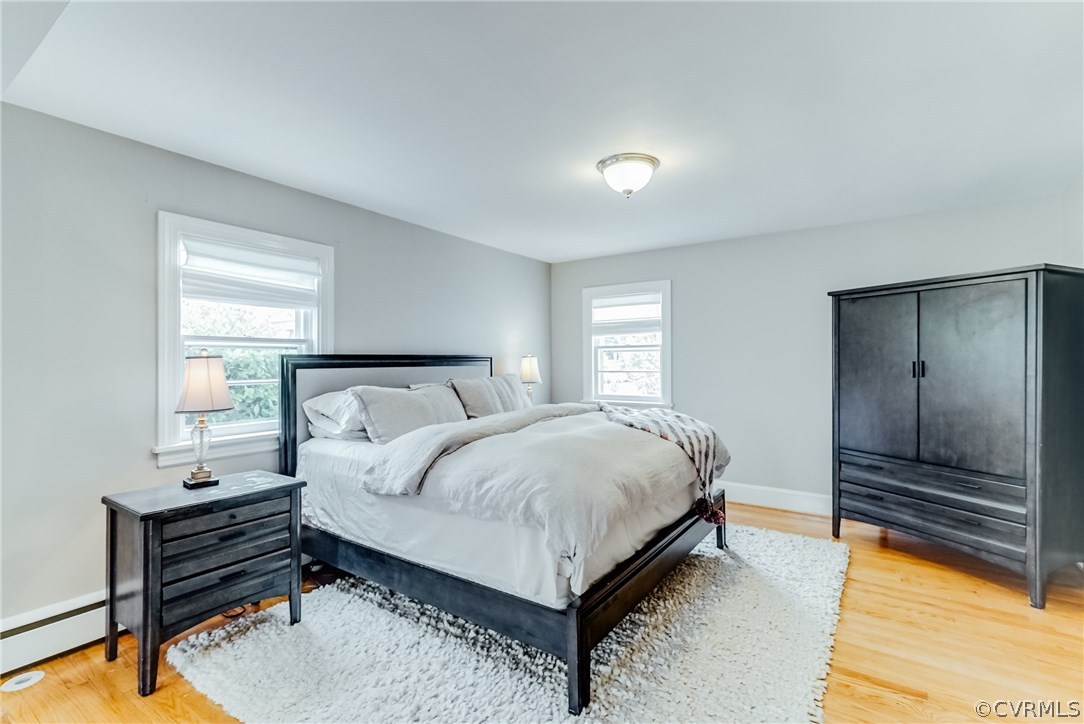 7202 River Road Henrico, VA 23229 - Photo 13 of 49 a bed room with a bed and a night stand