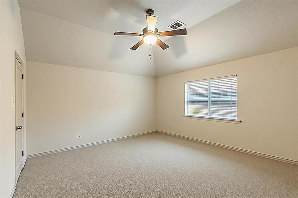 1217 Windmere Way Allen, TX 75013 - Photo 33 of 38 Spacious and filled with natural light, this secondary upstairs bedroom offers comfort, privacy, and convenient access to the shared Jack and Jill bathroom.