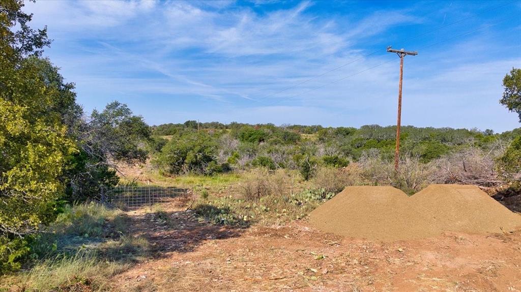 4900 State Highway 71 Voca, TX 76887 - Photo 22 of 29 a view of a lake with a mountain in the background