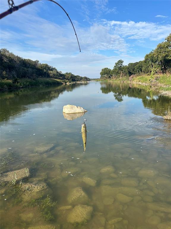 4900 State Highway 71 Voca, TX 76887 - Photo 26 of 29 a view of a lake