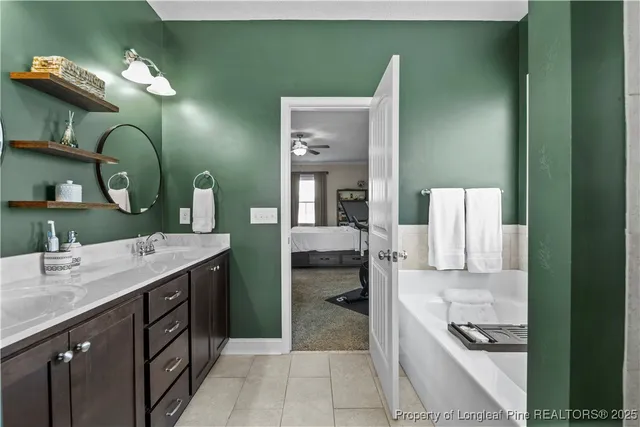 a bathroom with a double vanity sink and a mirror