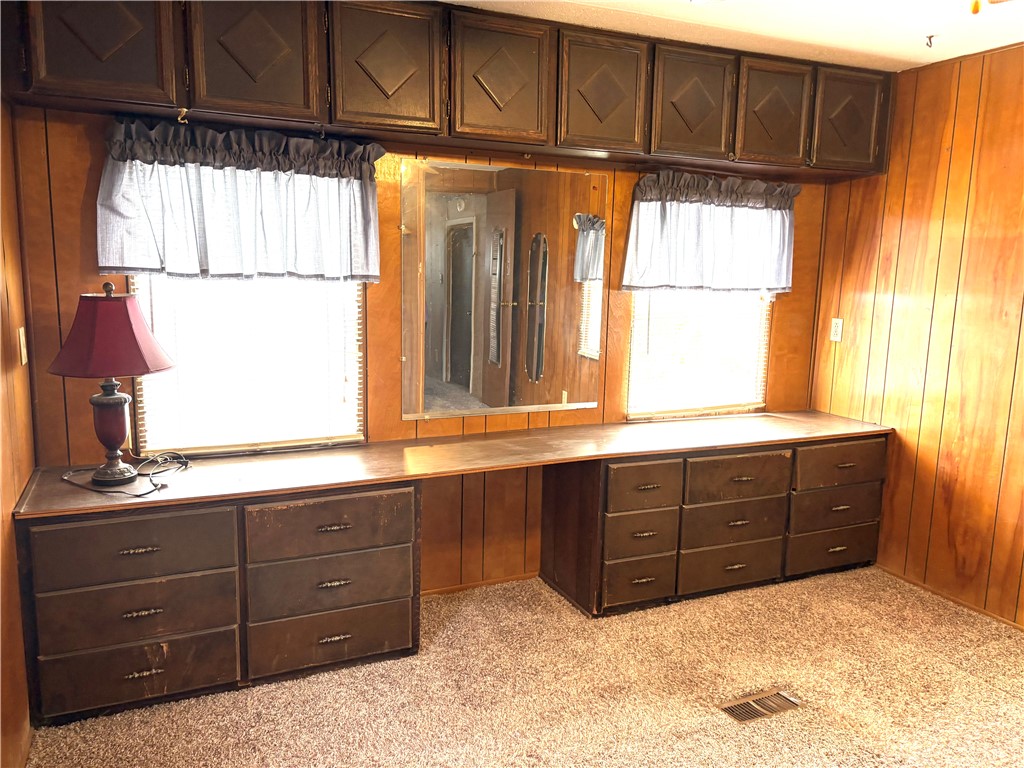 5434 North Waynesville Road, Unit 15 Oregonia, OH 45054 - Photo 3 of 19 This spacious bedroom offers ample storage and natural light for comfortable living.