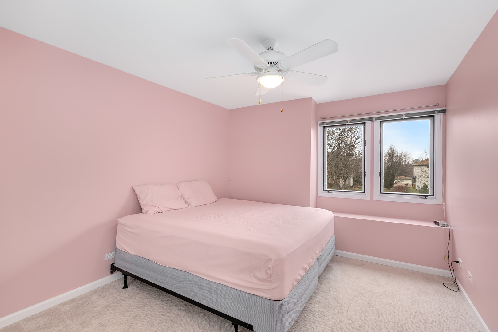 464 Lewis Road Geneva, IL 60134 - Photo 15 of 33 a bedroom with a bed and a chandelier