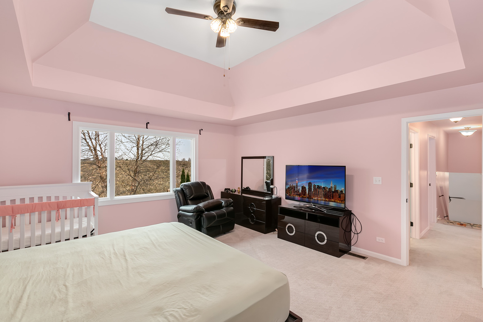 464 Lewis Road Geneva, IL 60134 - Photo 19 of 33 a large bedroom with a bed and a large window