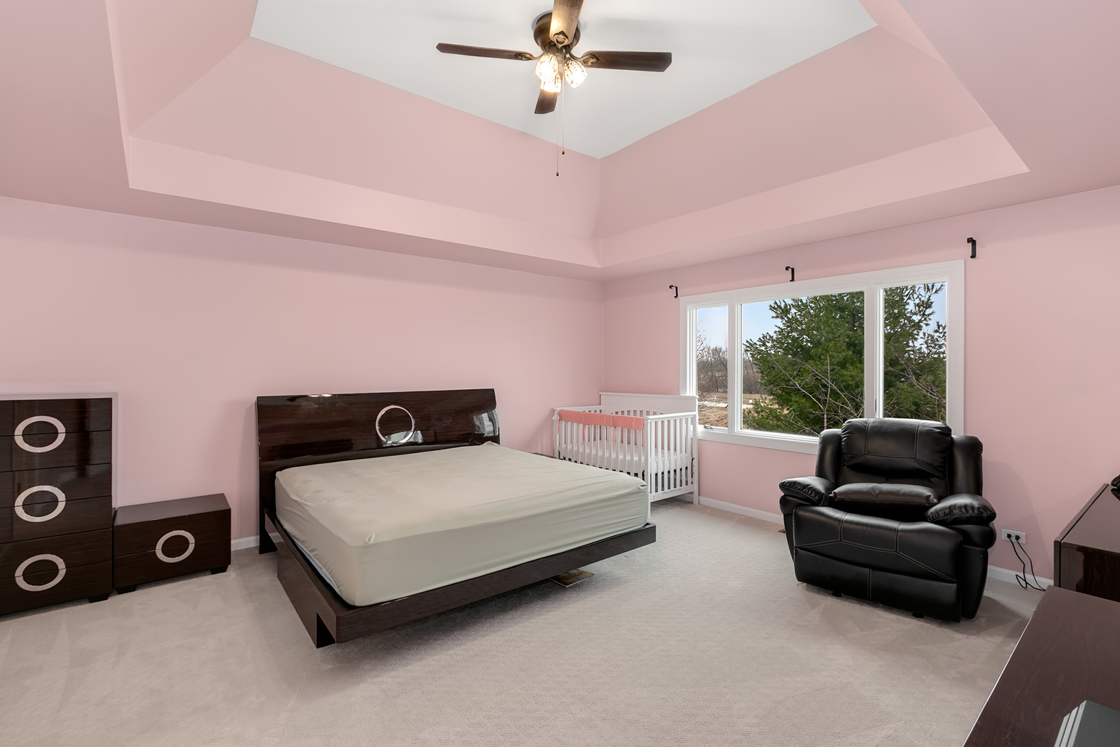 464 Lewis Road Geneva, IL 60134 - Photo 20 of 33 a bedroom with a bed a couch and a window