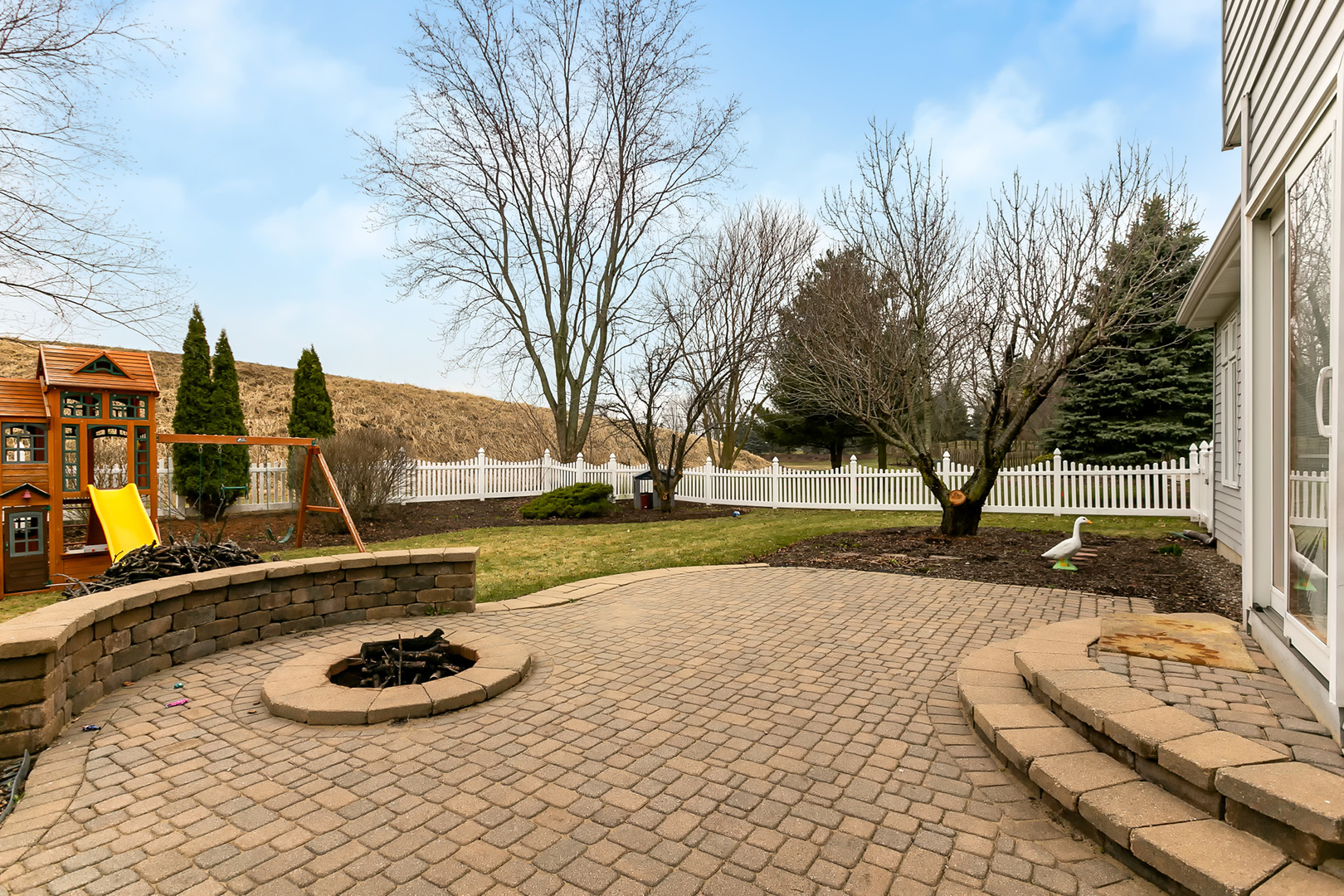 464 Lewis Road Geneva, IL 60134 - Photo 30 of 33 a view of a swimming pool with some plants and trees