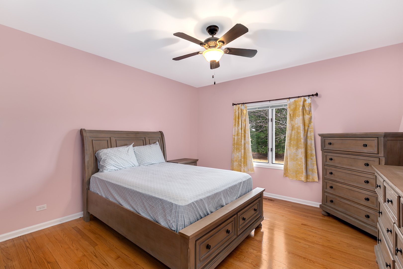 464 Lewis Road Geneva, IL 60134 - Photo 9 of 33 a bedroom with a bed and a table