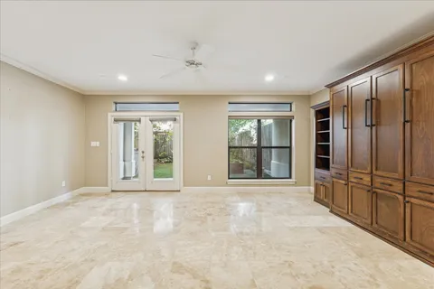 a view of an empty room with a fireplace