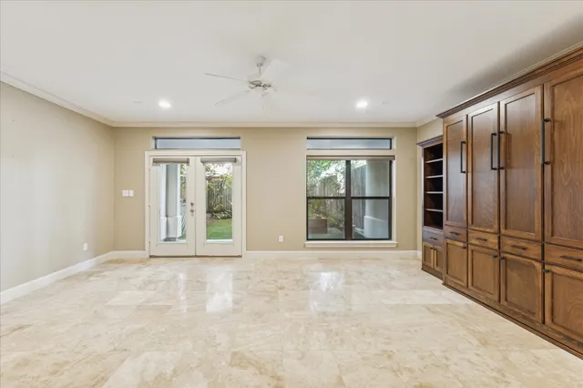 a view of an empty room with a fireplace