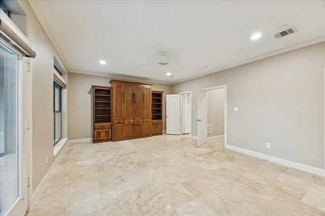 a bathroom with a granite countertop sink a mirror and a bathtub