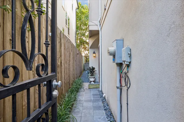 a front view of a building with a garden