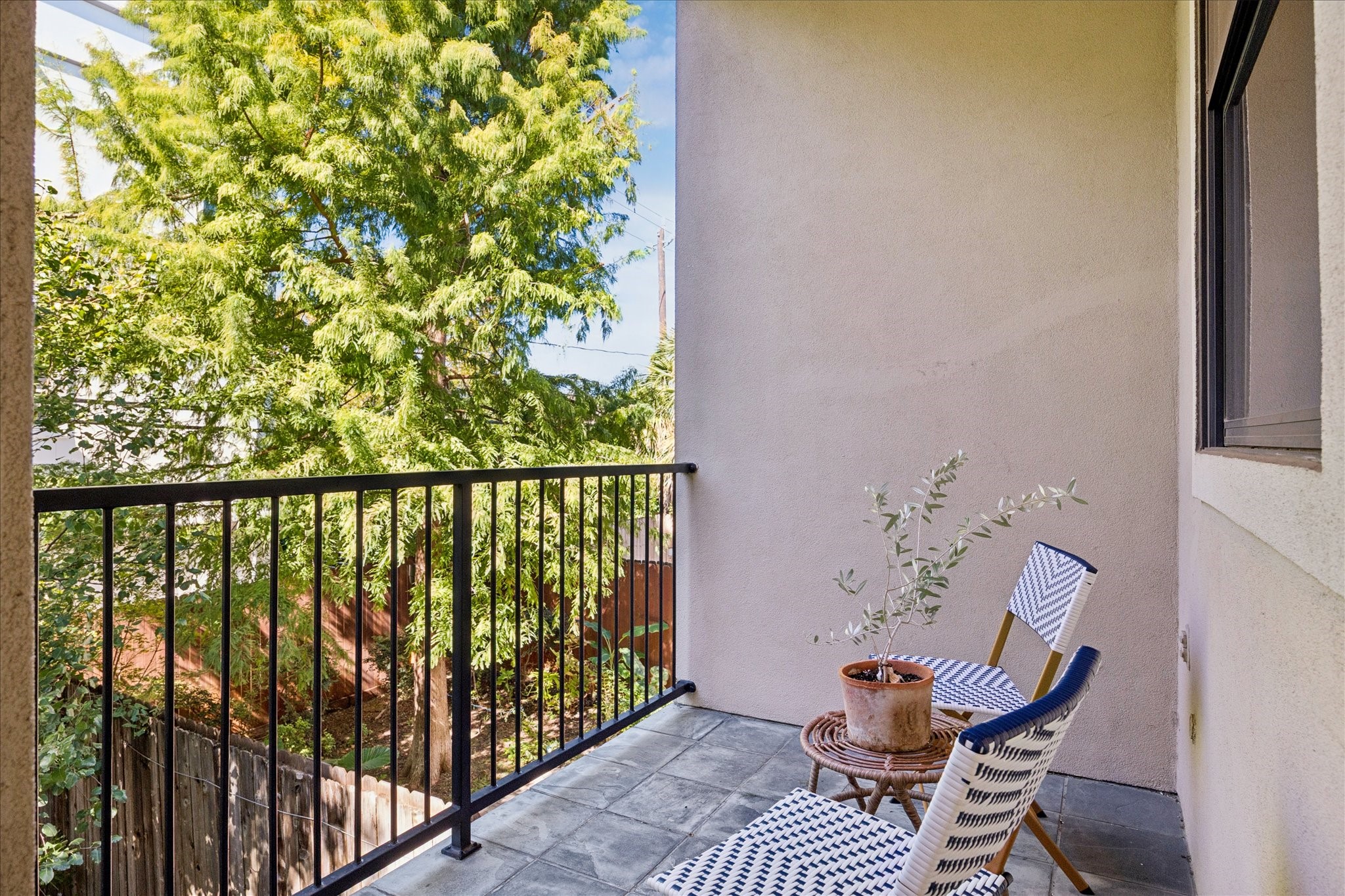 1712 McDuffie Street Houston, TX 77019 - Photo 8 of 27 a balcony with wooden floor