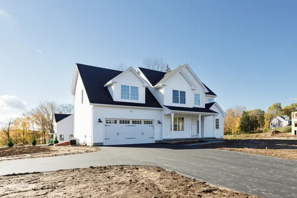 front view of a house with a street