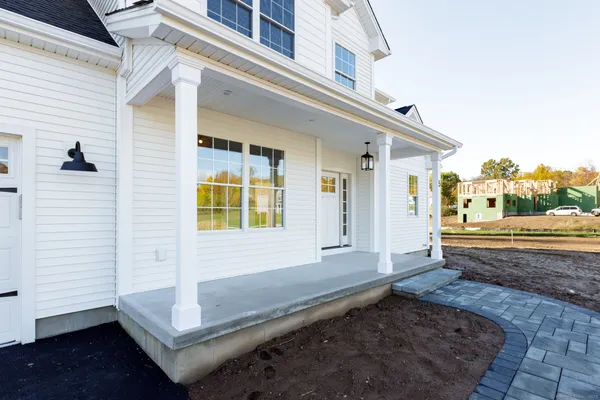 a view of a room with kitchen island and wooden floor