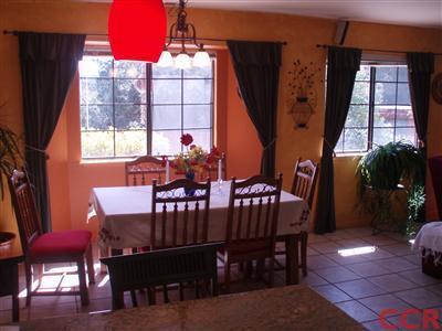 8550 Corriente Road Atascadero, CA 93422 - Photo 14 of 15 a view of a dining room with furniture and window