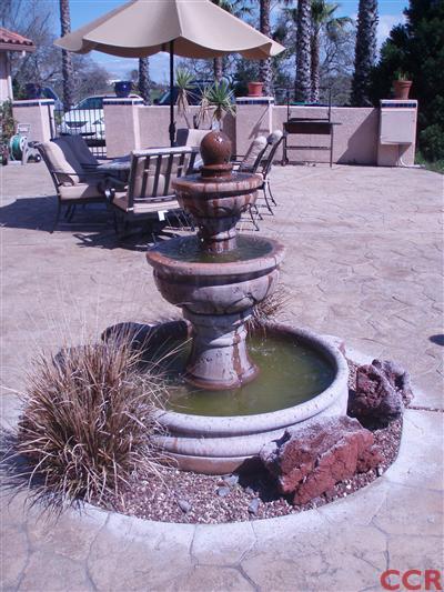 8550 Corriente Road Atascadero, CA 93422 - Photo 3 of 15 a view of a backyard with plants and patio