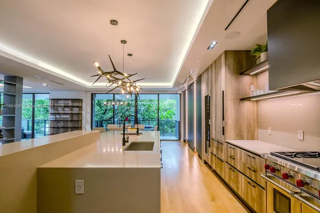 a view of an entryway with a floor to ceiling window