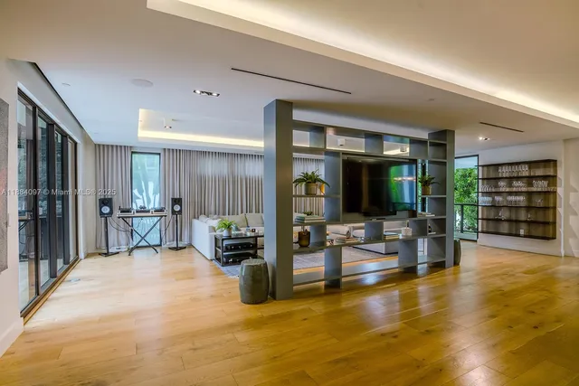 a view of a living room and dining room