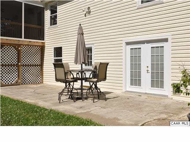 126 North Boston Road Troy, VA 22974 - Photo 30 of 39 The back side patio augments the screened porch and provides even more room for entertaining.