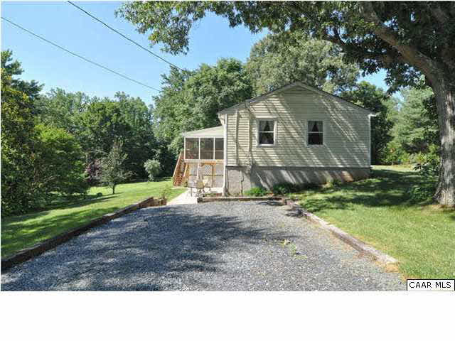 126 North Boston Road Troy, VA 22974 - Photo 34 of 39 Home side view. The owners have routed the gutters and drains properly so the basement stays very dry!