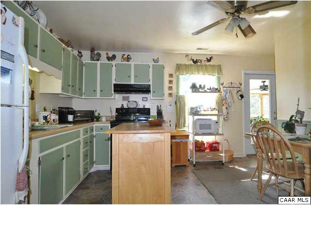 126 North Boston Road Troy, VA 22974 - Photo 9 of 39 The eat-in kitchen has loads of country charm.