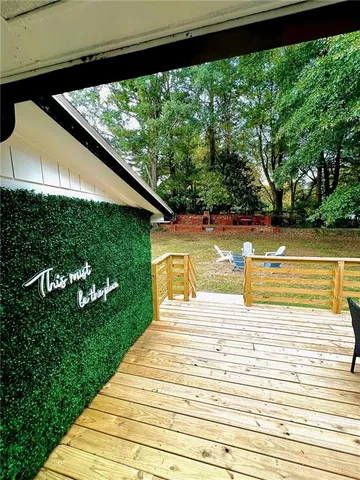 a view of swimming pool from a balcony