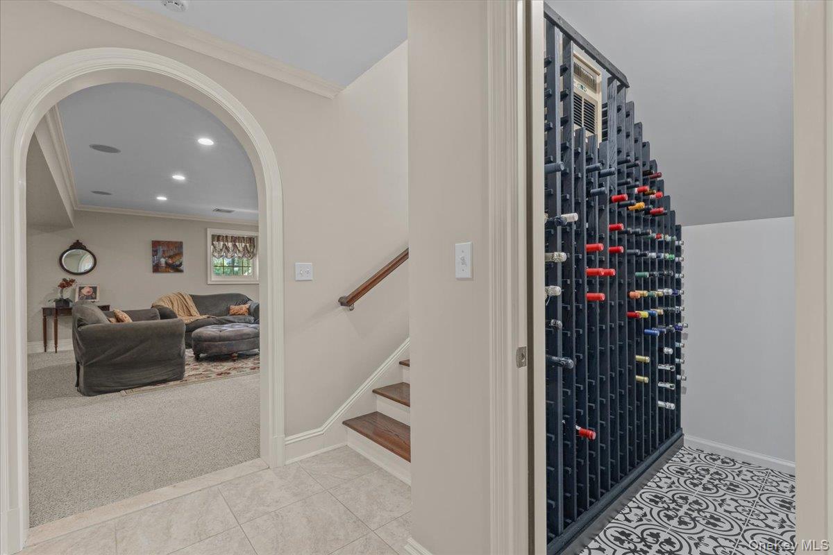 135 Pines Bridge Road Katonah, NY 10536 - Photo 31 of 40 a view of entryway with a flower pot and a wooden floor