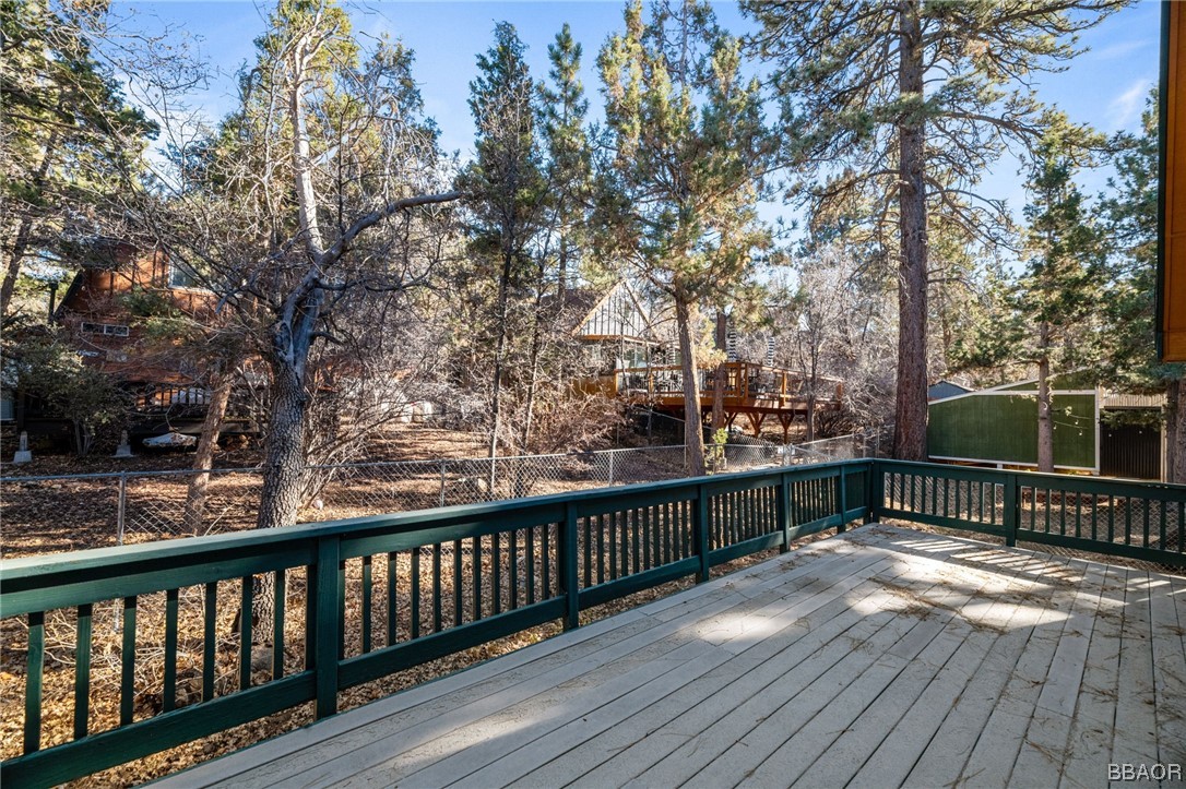 307 Riverside Avenue Sugarloaf, CA 92386 - Photo 29 of 31 a view of a balcony with wooden floor