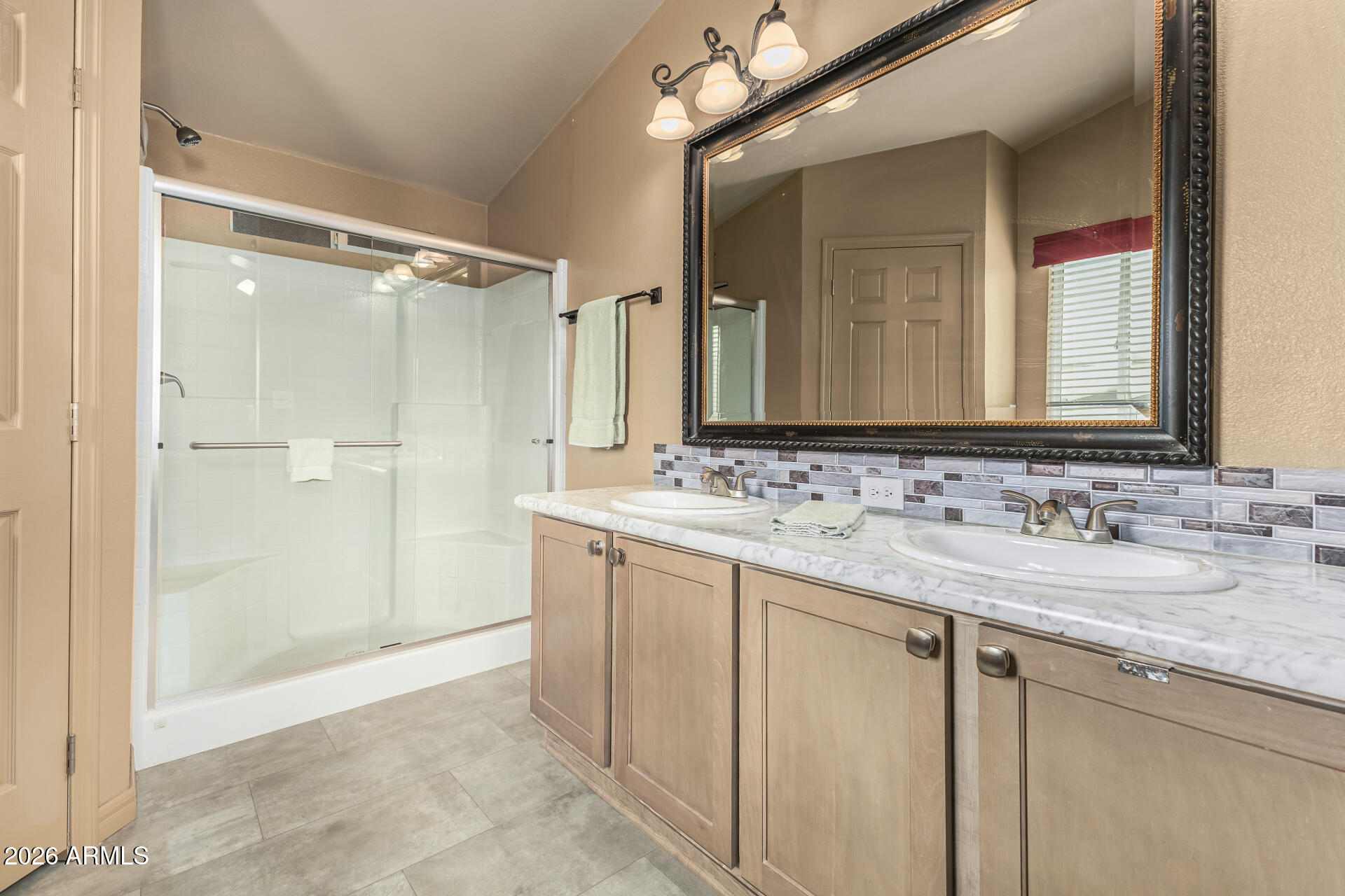 9302 East Broadway Road, Unit 117 Mesa, AZ 85208 - Photo 15 of 24 a bathroom with a granite countertop sink mirror and double