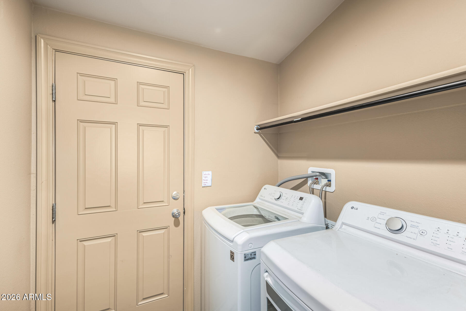 9302 East Broadway Road, Unit 117 Mesa, AZ 85208 - Photo 21 of 24 a utility room with dryer and washer