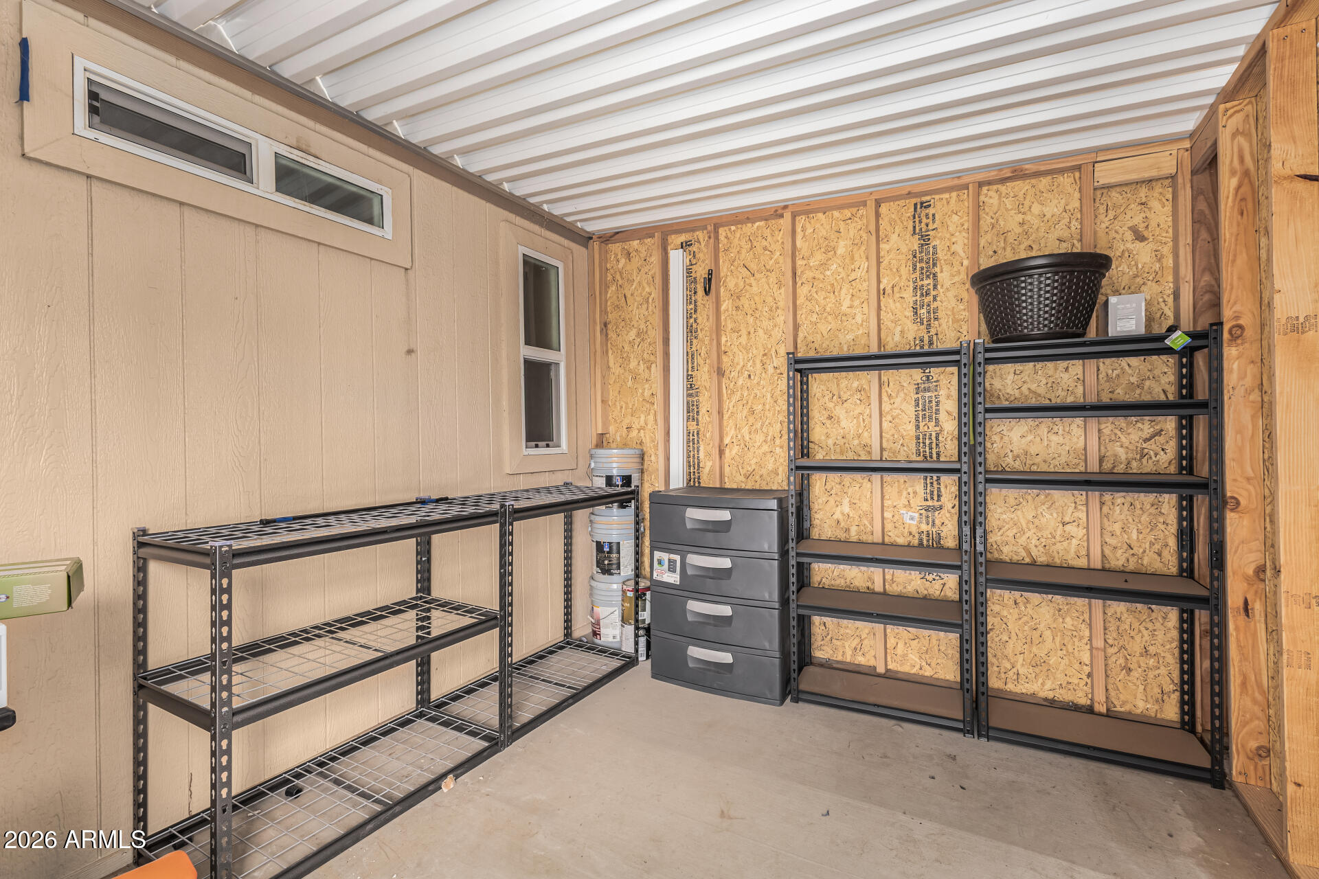 9302 East Broadway Road, Unit 117 Mesa, AZ 85208 - Photo 22 of 24 a view of bedroom with furniture and large window