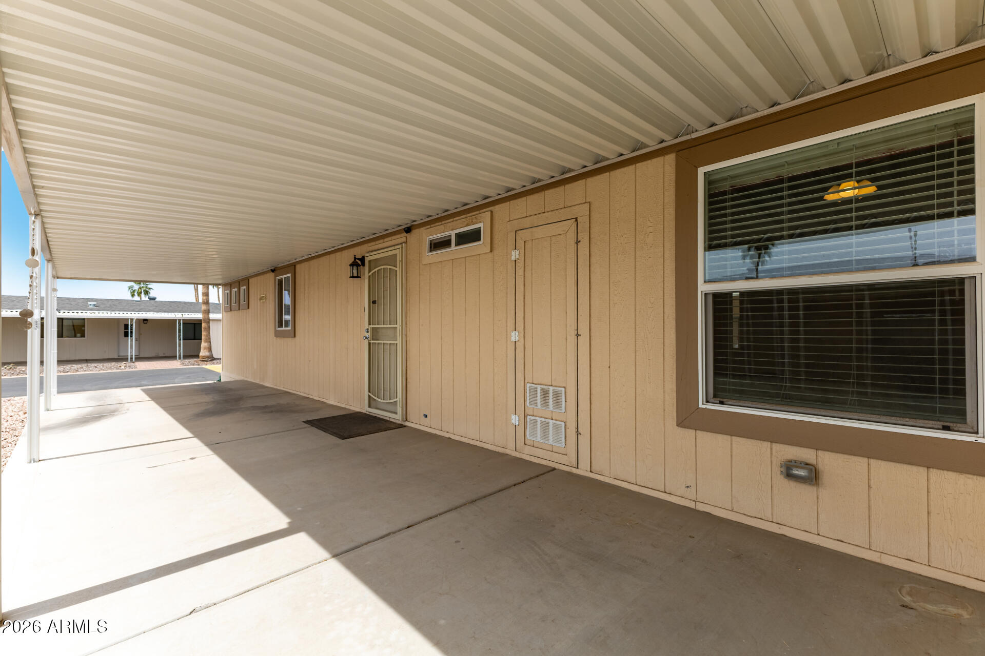 9302 East Broadway Road, Unit 117 Mesa, AZ 85208 - Photo 23 of 24 a view of a porch