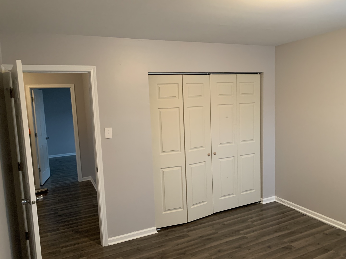 824 South 13th Avenue Maywood, IL 60153 - Photo 5 of 10 a view of an empty room with wooden floor