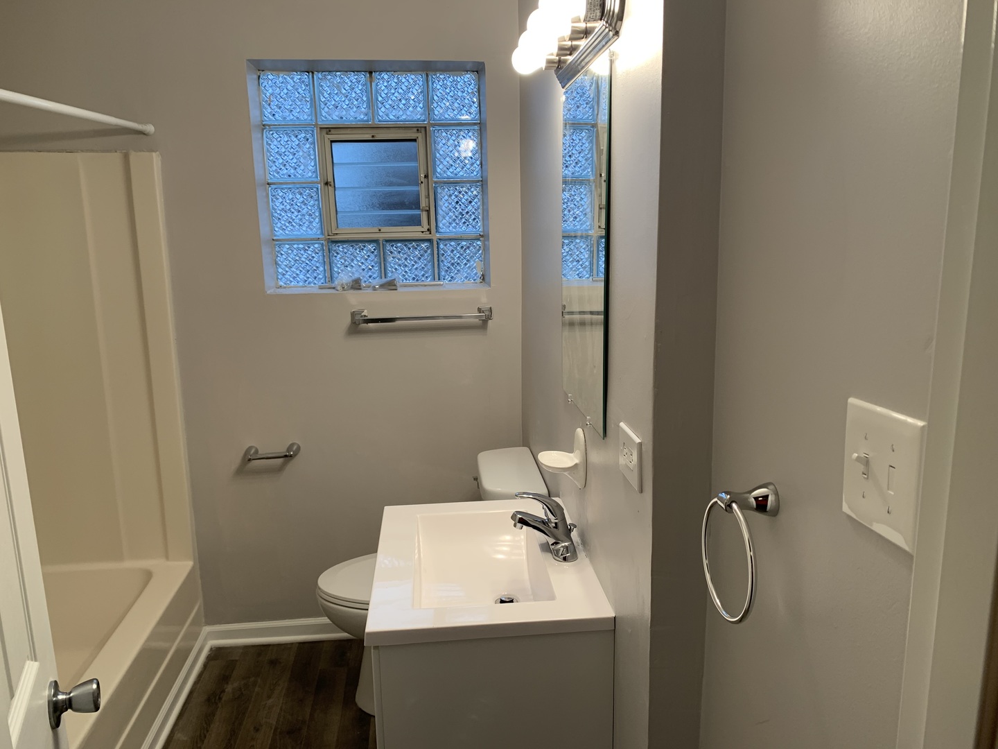 824 South 13th Avenue Maywood, IL 60153 - Photo 7 of 10 a bathroom with a sink toilet and shower