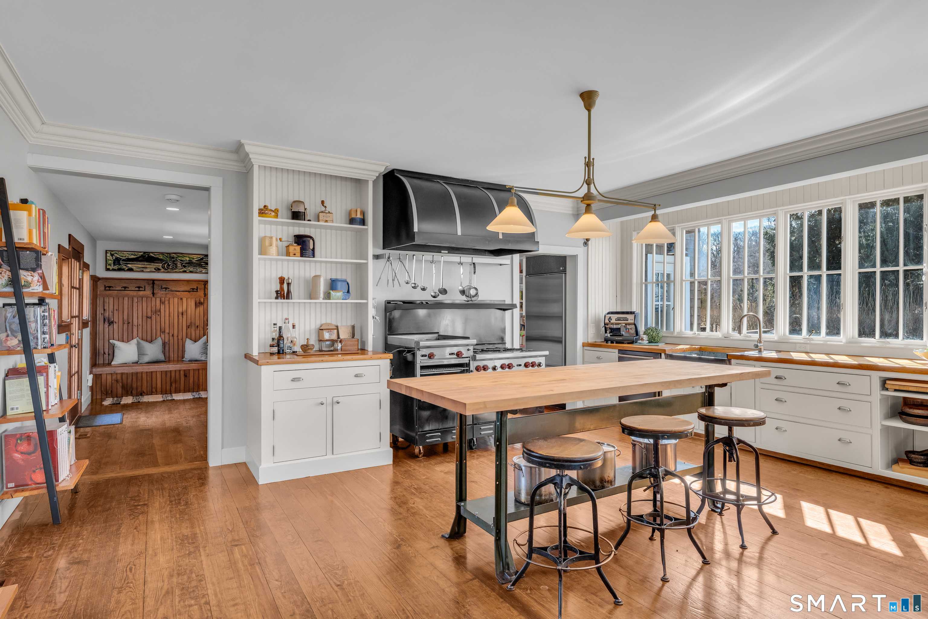 100 Old Black Point Road East Lyme, CT 06357 - Photo 11 of 40 A true chef's kitchen equipped with a professional Wolf gas range a spacious kitchen island and 2 pantries.