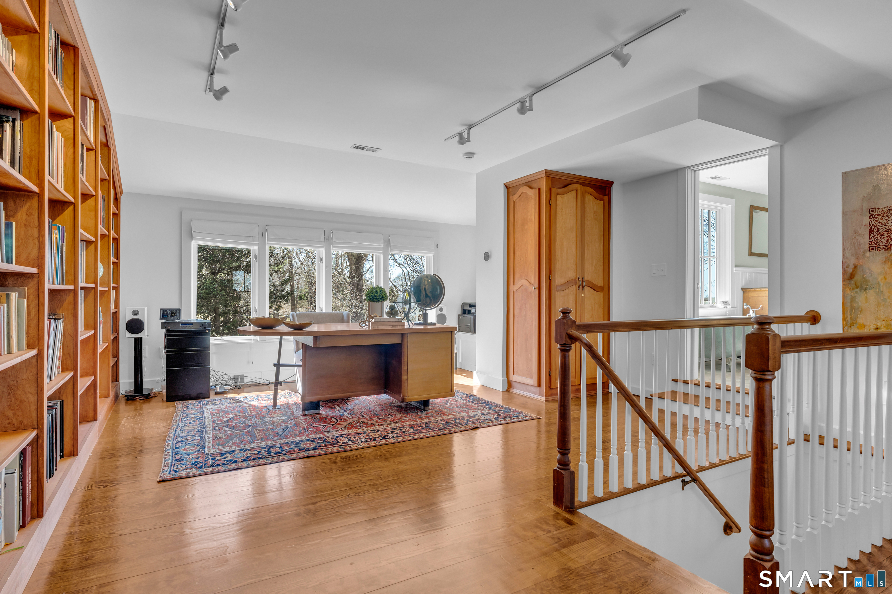 100 Old Black Point Road East Lyme, CT 06357 - Photo 22 of 40 The office has floor to ceiling built-in book cases creating a great work from home space.