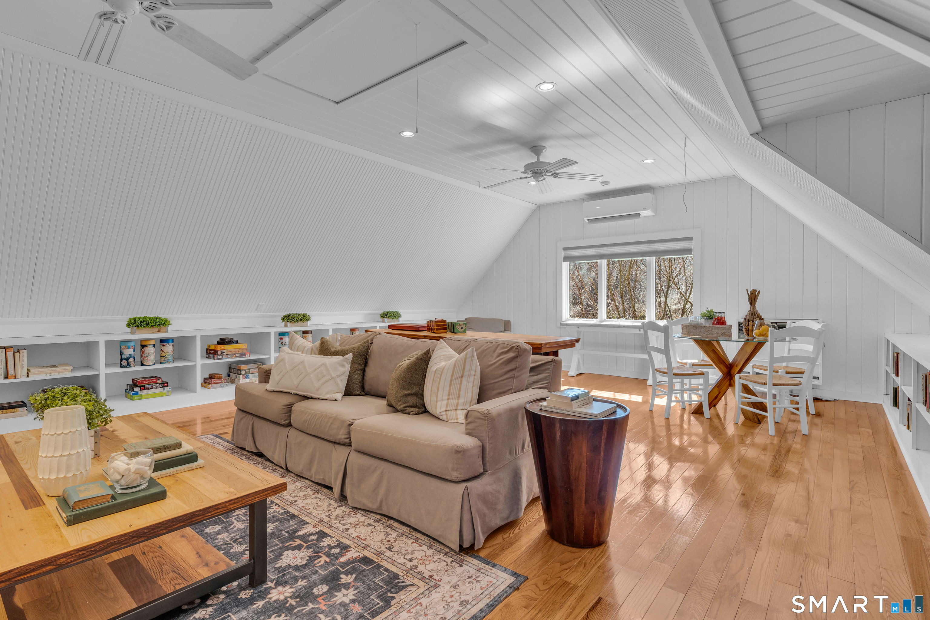 100 Old Black Point Road East Lyme, CT 06357 - Photo 24 of 40 The media room is a great space for games, movies or a play room with custom built-ins throughout.