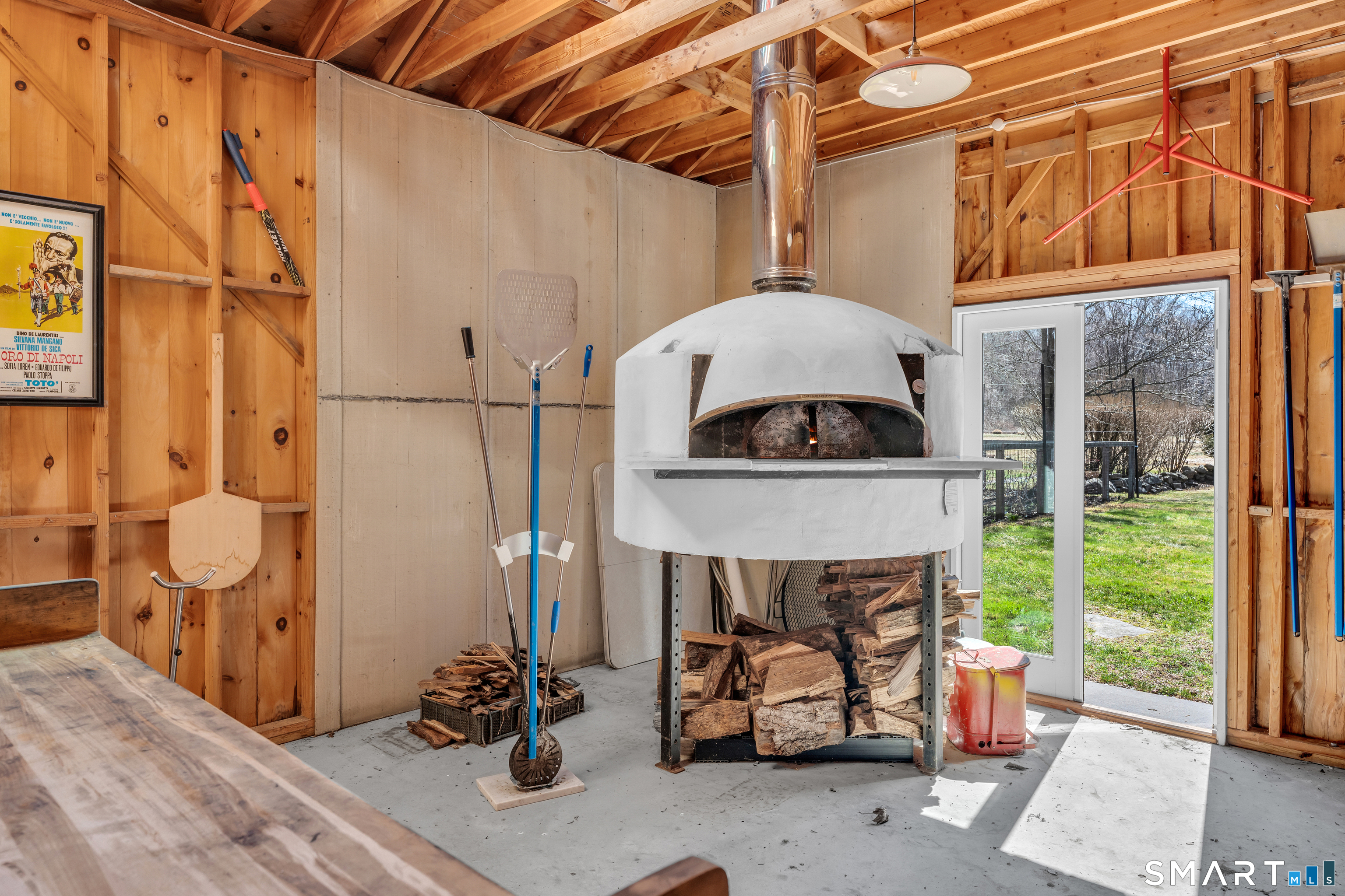 100 Old Black Point Road East Lyme, CT 06357 - Photo 37 of 40 The "Pizza Barn" houses this custom wood fired pizza oven from Italy.