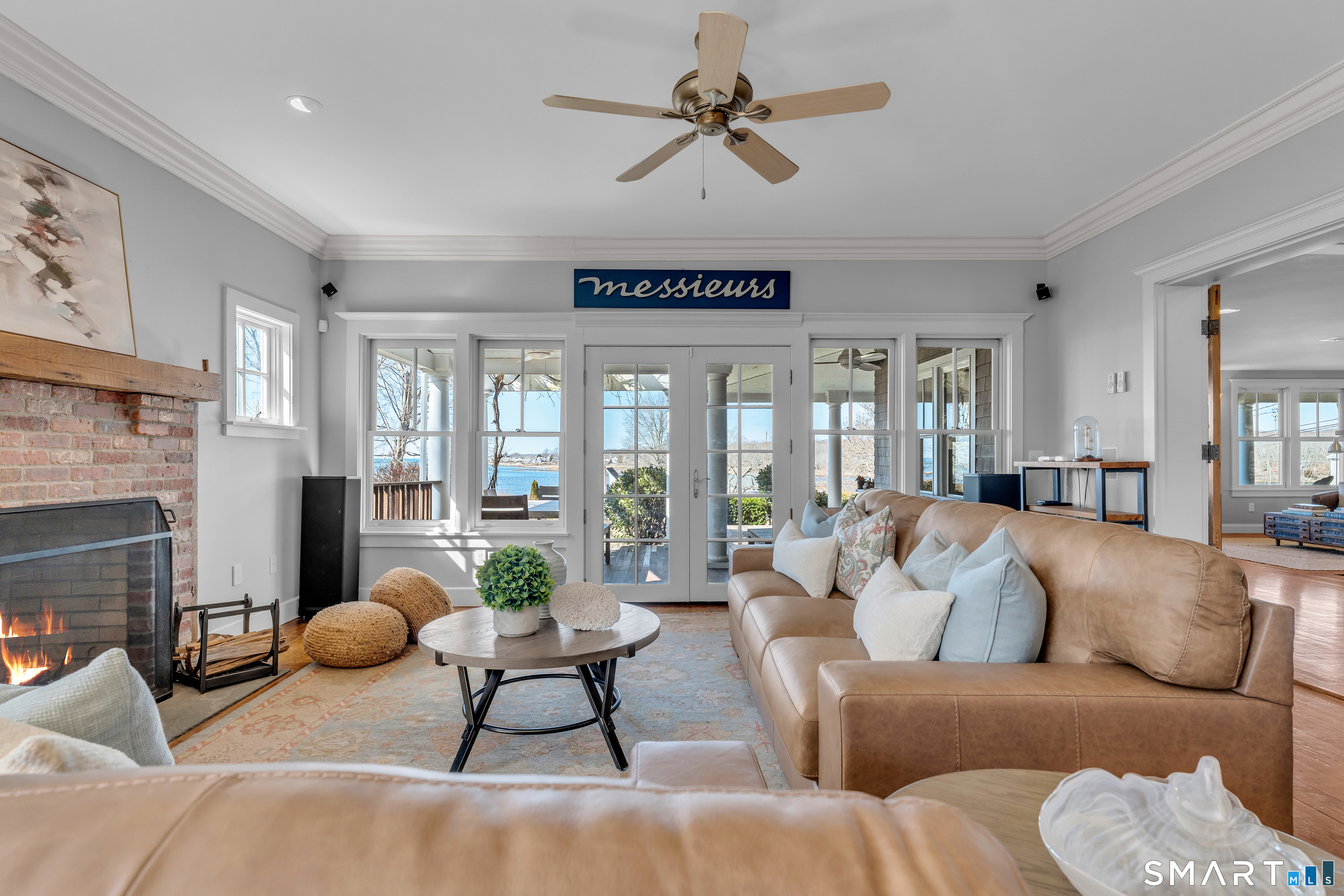 100 Old Black Point Road East Lyme, CT 06357 - Photo 6 of 40 The Great Room is open to the gourmet kitchen with French doors opening to the porch with beautiful water views.