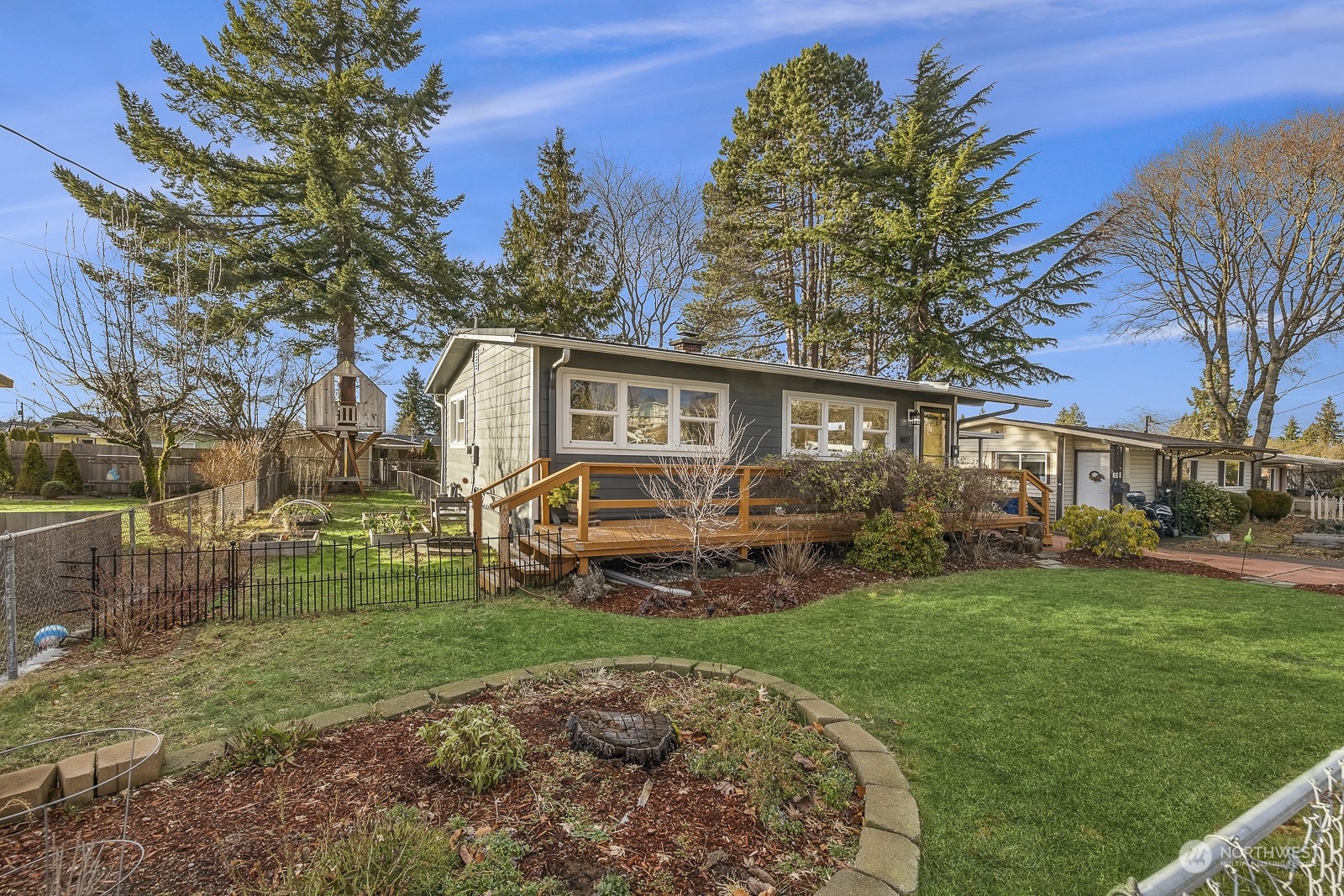 807 Edmonds Avenue Northeast Renton, WA 98056 - Photo 1 of 38 a view of a yard in front of house