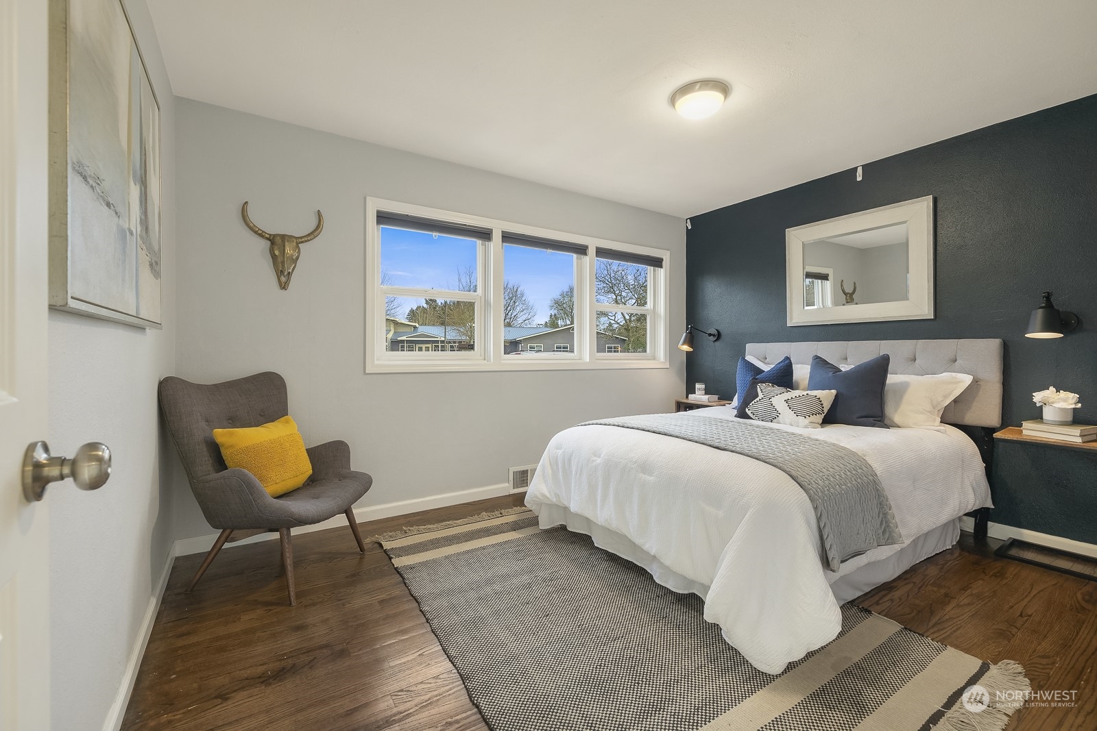 807 Edmonds Avenue Northeast Renton, WA 98056 - Photo 13 of 38 a bedroom with a bed and window