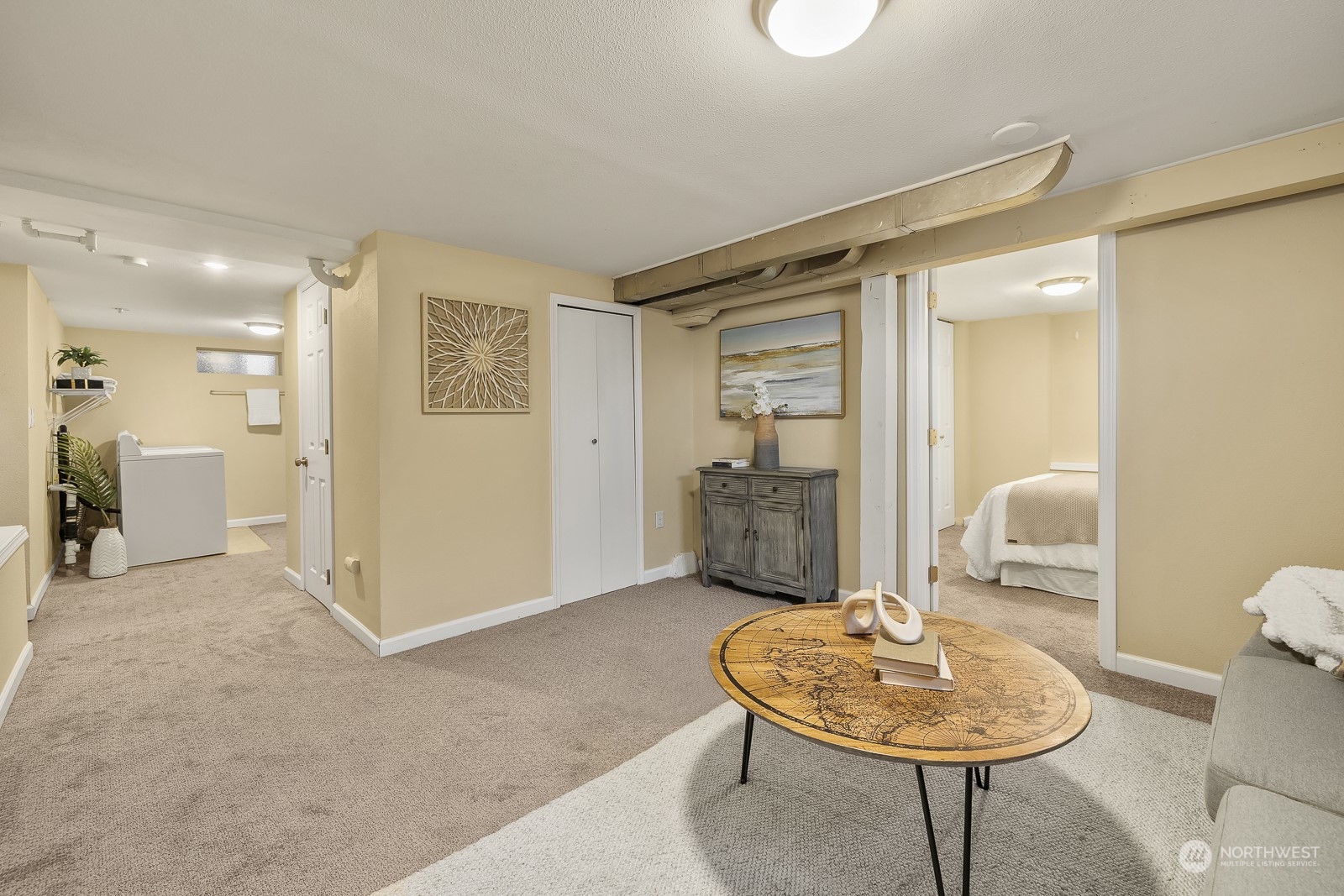 807 Edmonds Avenue Northeast Renton, WA 98056 - Photo 21 of 38 a living room with furniture and a table