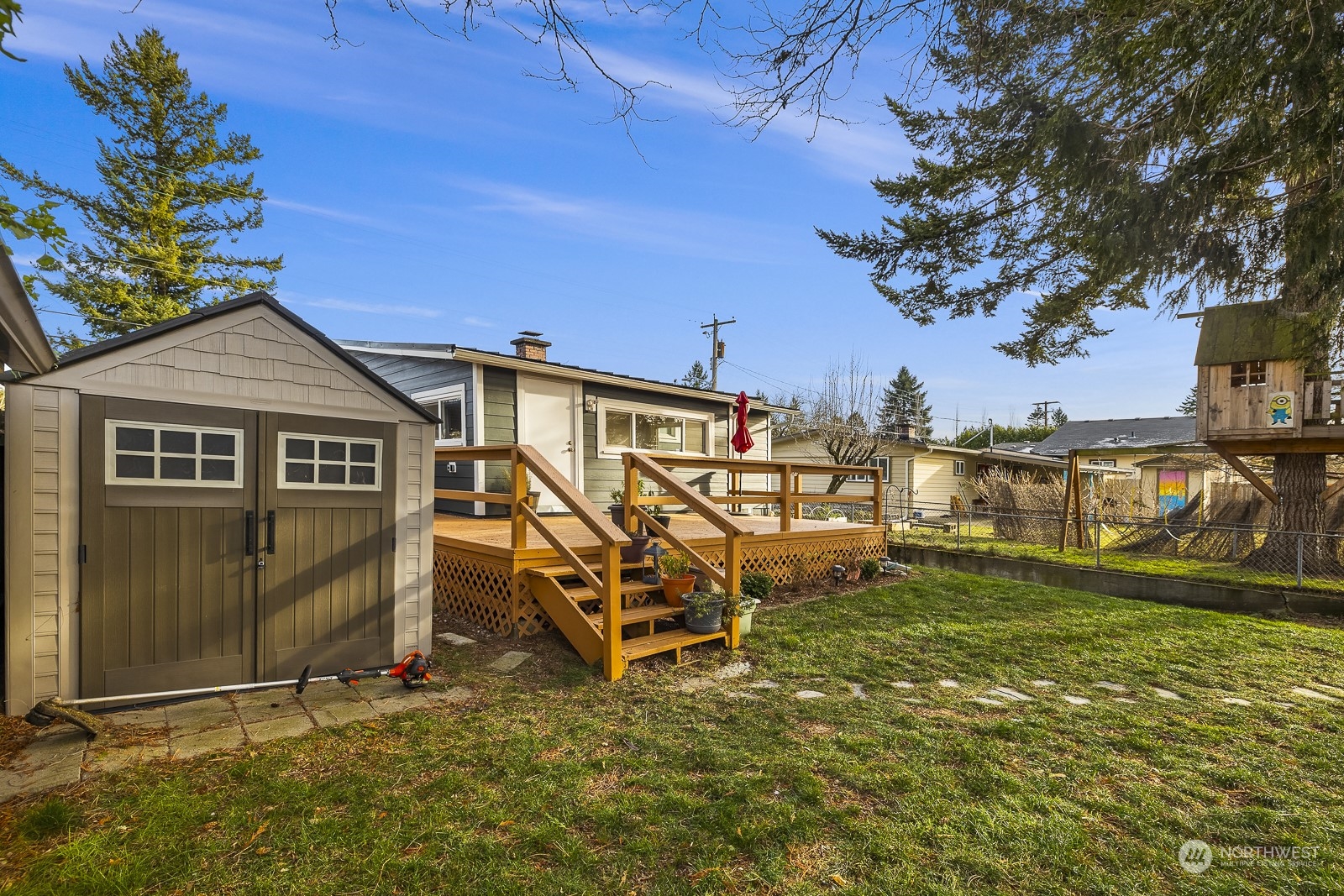 807 Edmonds Avenue Northeast Renton, WA 98056 - Photo 32 of 38 a view of a house with a yard