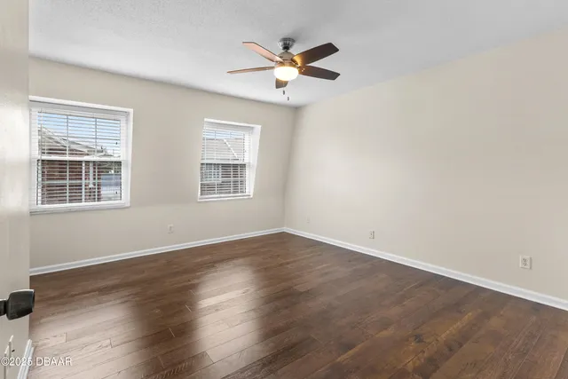 a swimming pool with outdoor seating and yard